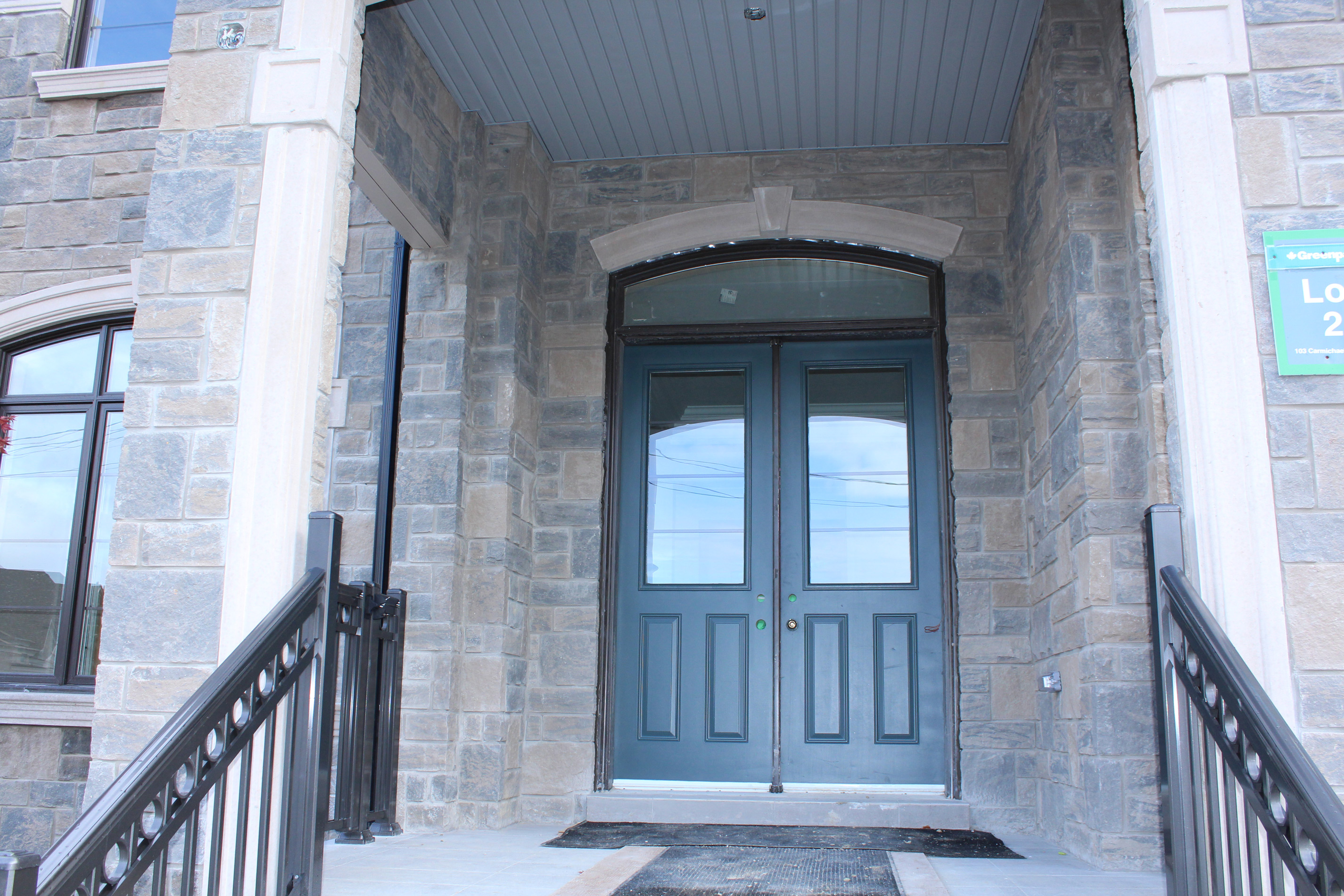 Princess Margaret Home front entrance close-up - Brick color is Westford, Stone color is Edgerock Delta Blend