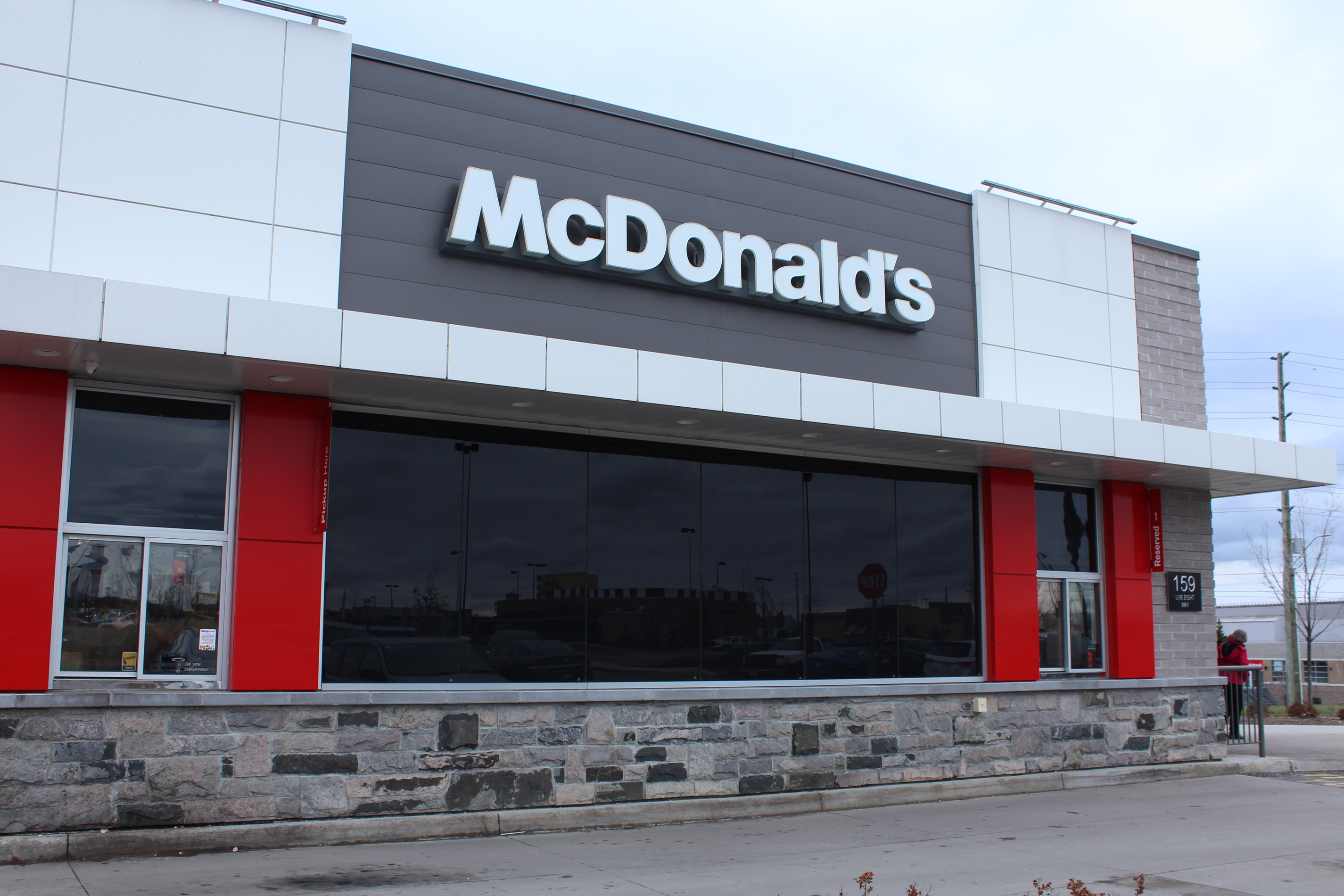 Drive-thru shot of McDonald's building and logo - Block colour Dover Grey / Diamond Black