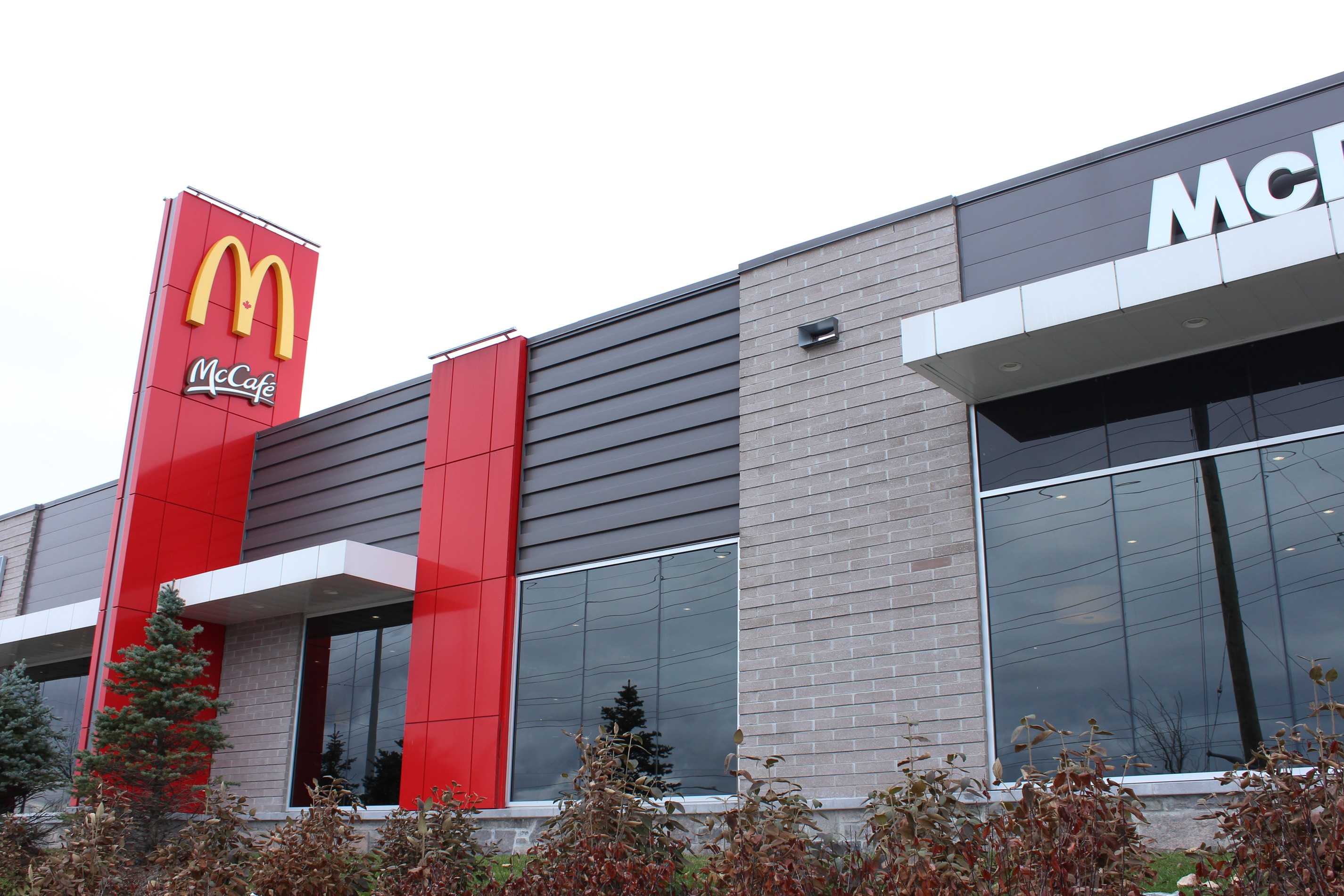 Side shot of McDonald's building - Block colour Dover Grey / Diamond Black