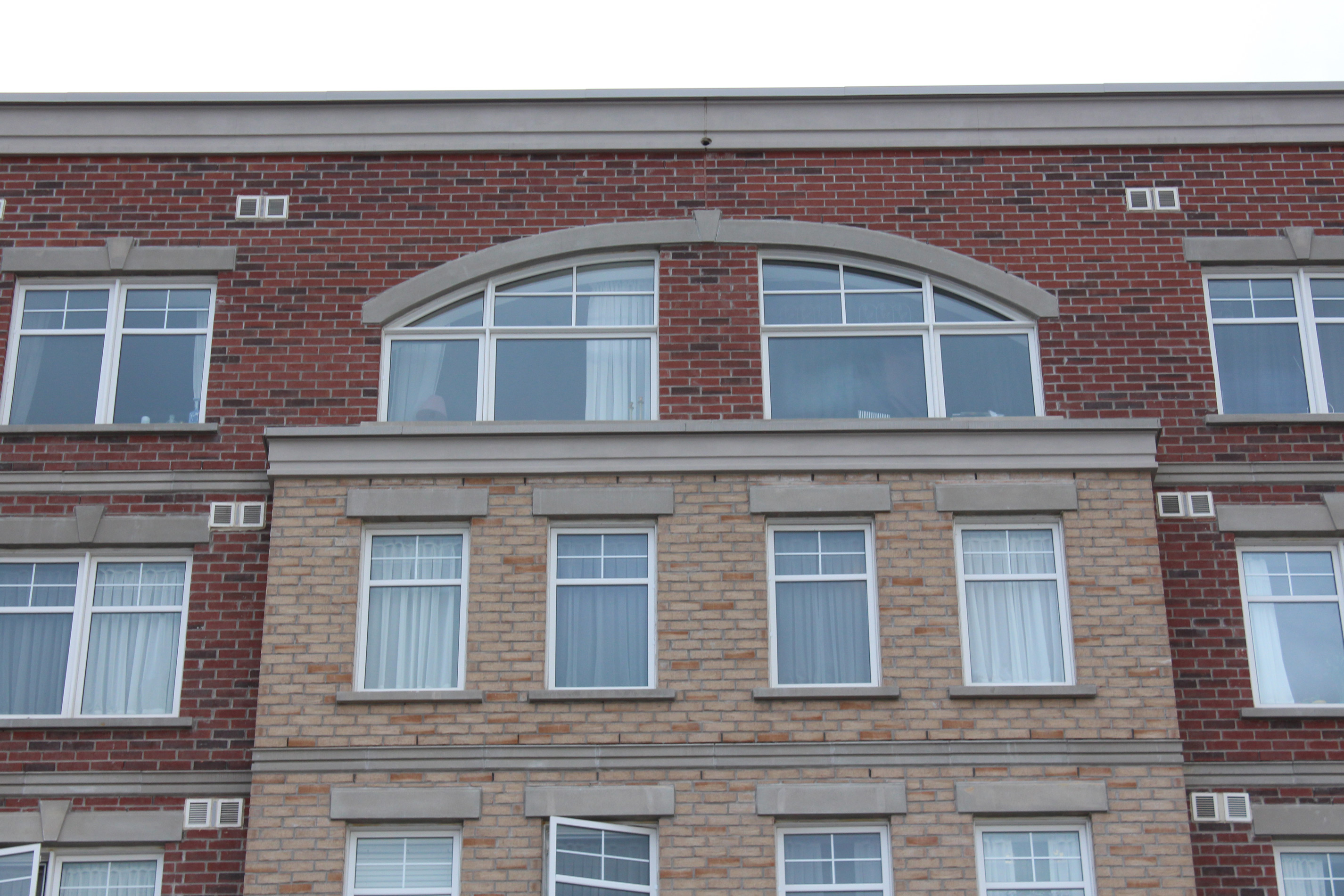 Close-up window shot - Stone colour is Vivace Milano, Brick colour is Old Chicago with Sandstone accents