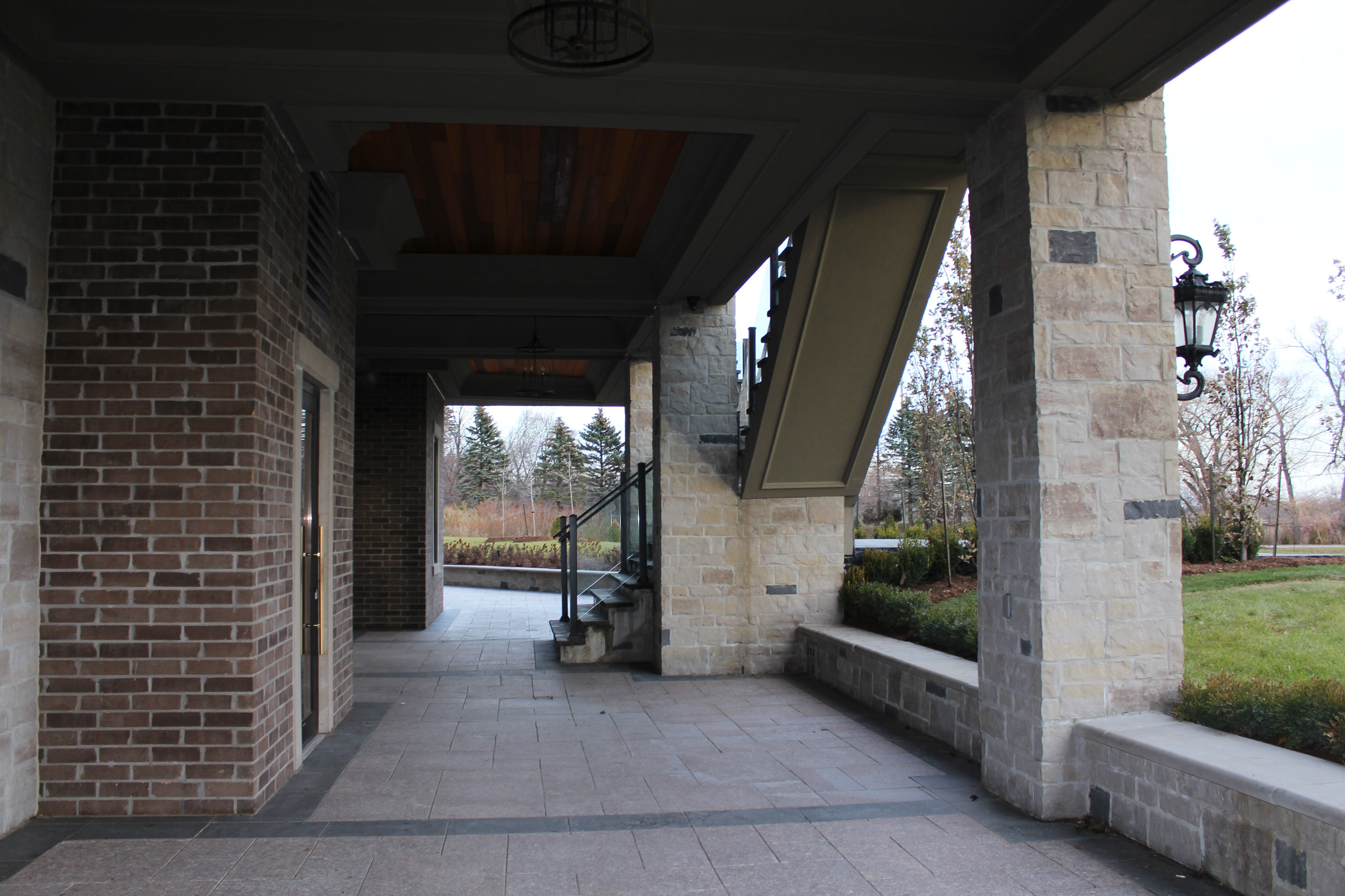 Outside stairs at ground level. - Stone colour is Vivace Milano, Brick colour is Sierra Brown