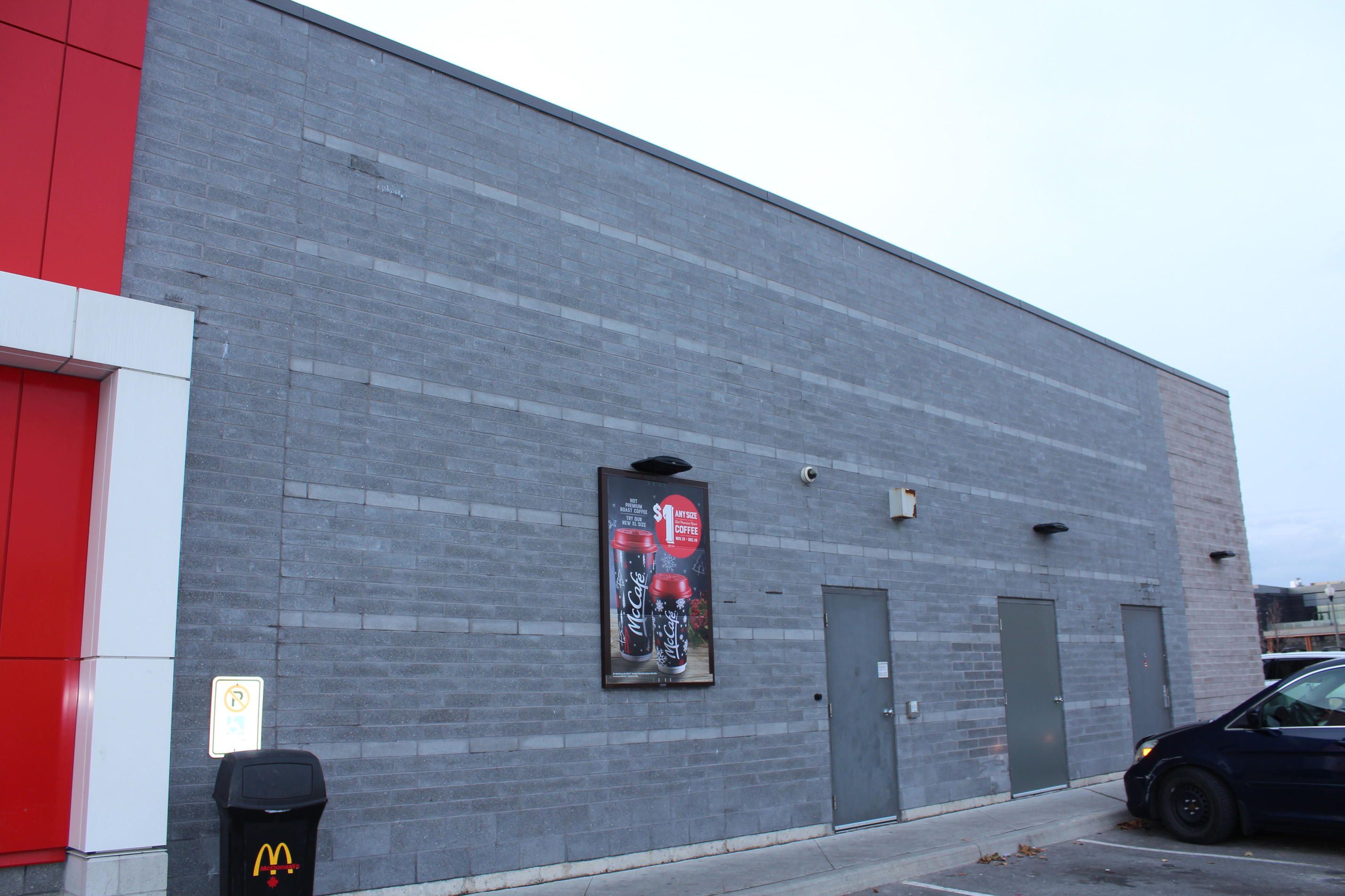Rear shot of McDonald's building - Block colour Dover Grey / Diamond Black